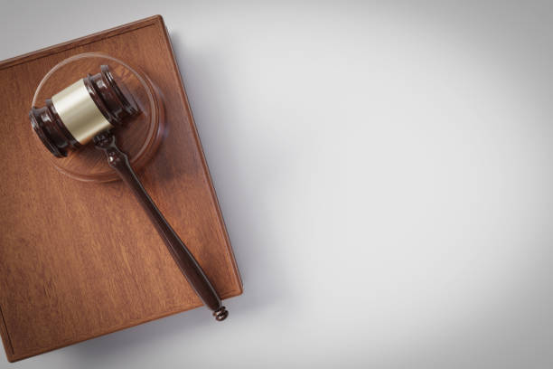 istock law court gavel hammer topview, 3d rendering 1455116372