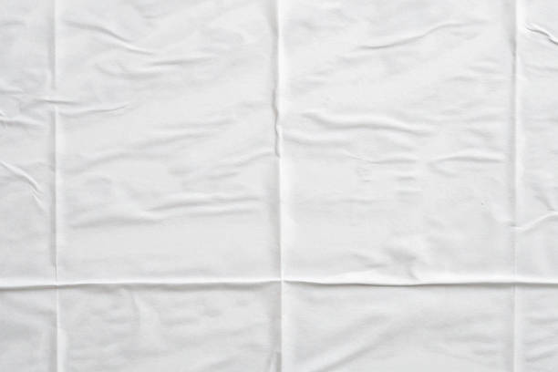 istock white crumpled and creased paper poster texture background 1455118357