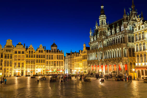 The Grand Place in Brussels The Grand Place in Brussels in a beautiful summer nigth, Belgium houses in brussels stock pictures, royalty-free photos & images