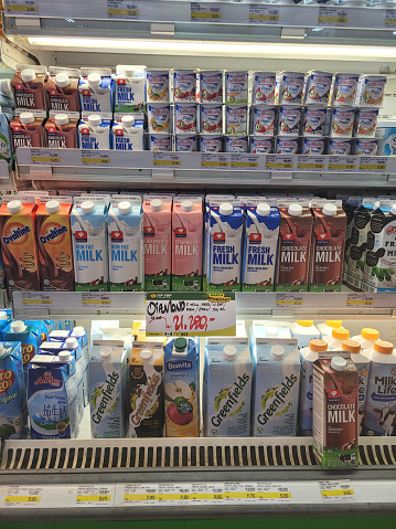 Tangerang, Indonesia - January, 2023: Variety brand of milk in indonesia on rack at supermarket shelf