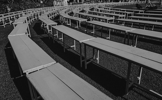 black and white, Seats lined up shadowed by the light