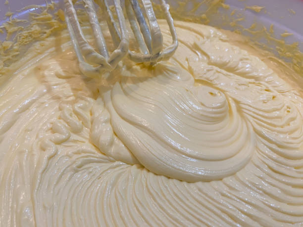 istock Close up Bowl cake batter dough electric mixer 1455145979