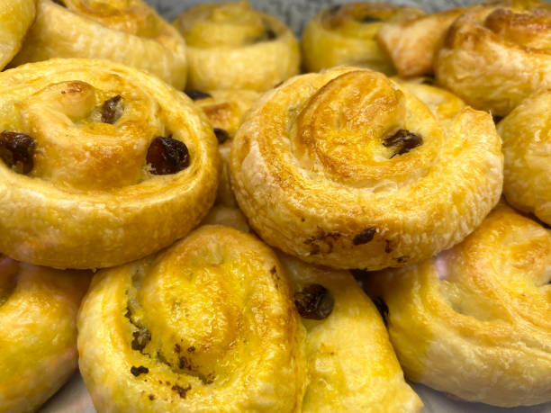 istock delicious pains aux raisins pastry rolls. snail roll pastry cake 1455146072