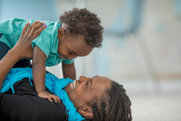 istock Mother and Son Laying Down 1455147058