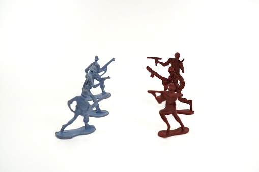 The image shows a gray and red infantry unit model facing each other on a white background, close up.