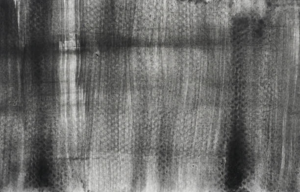 istock Abstract background by hand drawn gray and black color liquid drip 1455150832