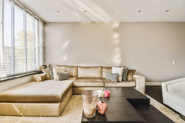 istock a living room with a couch and a coffee table 1455154152