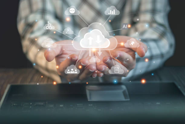 istock Businesswoman using laptop showing cloud computing diagram shown up a hand. Cloud technology.  data storage Finance and protection, network connection and internet service concepts. 1455155104