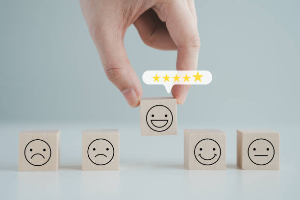 Hand choosing happy smiling face with 5 star on speech bubble. Feedback rating and positive service review. Customer experience, World mental health day, think positive, Emotion, satisfaction survey. Hand choosing happy smiling face with 5 star on speech bubble. Feedback rating and positive service review. Customer experience, World mental health day, think positive, Emotion, satisfaction survey. i 5 stock pictures, royalty-free photos & images