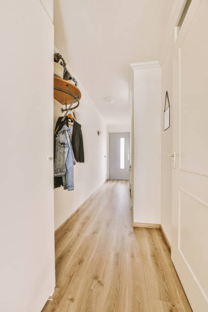 istock a hallway with white walls and a closet with clothes 1455156063