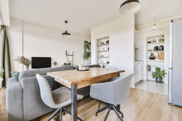 istock a living room with a wooden table and a couch 1455156109