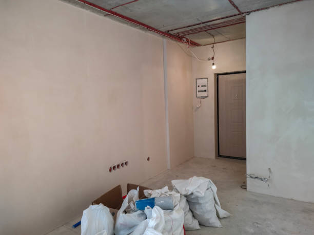 istock White polypropylene bags filled with construction debris in the apartment. 1455167968