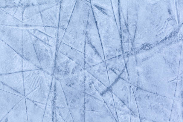 istock Empty ice rink with skate marks after the session outdoor. 1455168013
