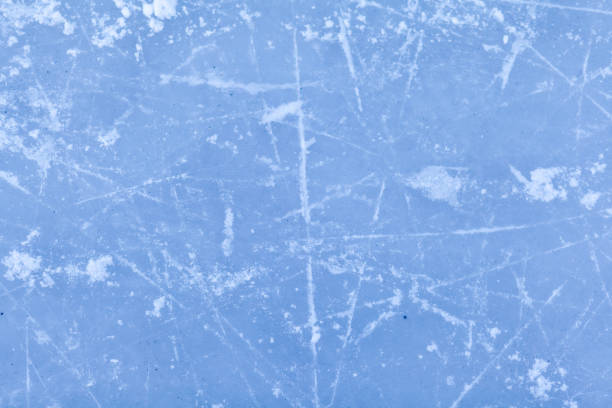 istock Empty ice rink with skate marks after the session outdoor. 1455168078
