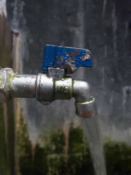 istock old water faucet is rusty and mossy 1455170945