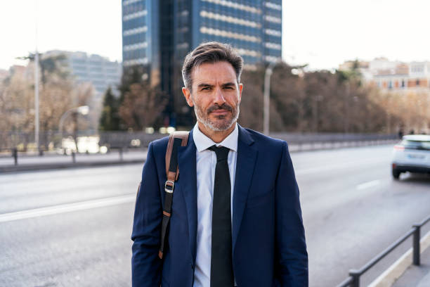 istock Friendly male entrepreneur on street 1455172358