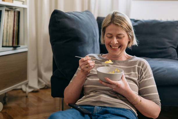istock woman at home 1455177269