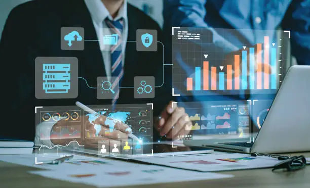 Photo of Data Management System (DMS) and Business Analytics Concept. businessman working and analysis connect to the dashboard to provide information for Key Performance Indicators (KPI), marketing analysis