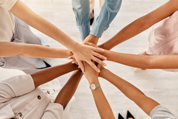 istock Support, community and teamwork with hands of business people for training, goals and management. Collaboration, mission and vision with employee in circle for diversity, networking and workshop 1455184091