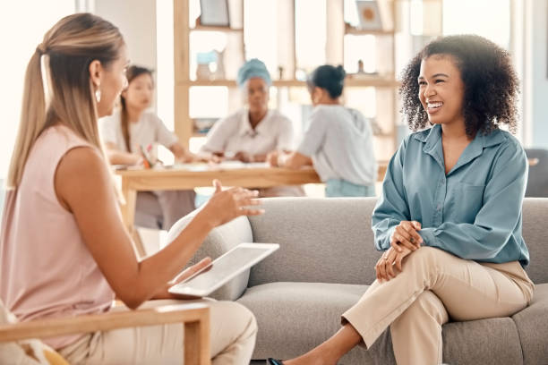 istock Teamwork, black business women with tablet for digital SEO, planning or collaboration for analytics review. Designer, startup innovation or SEO data leader for meeting, motivation or success planning 1455193614