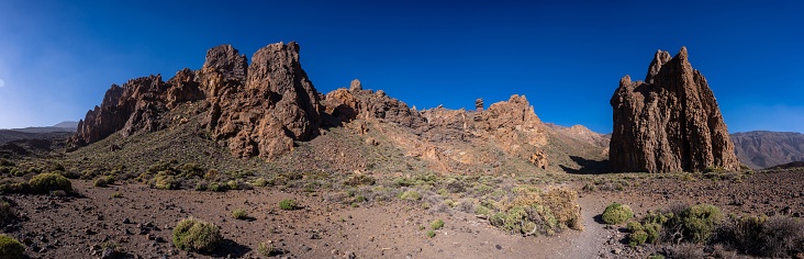 A panoramic view of the mountain of the Cathedral between Roques de Gracia and Roque Cinchado in the natural area of Teide in Tenerife, Canary Islands