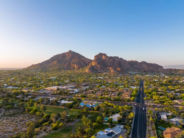 istock Camelback Mountain at sunrise in Phoenix, Arizona golf course and luxury homes 1455198662