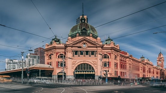 Melbourne, Australia – April 04, 2019: The iconic Flinders Street Station facade. Looking straight on at the station opening on the corner of Flinders Street and Swanston Streets Melbourne.