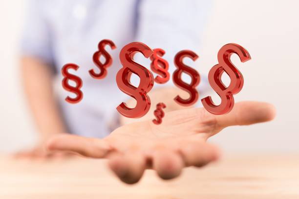 istock Person presenting a virtual projection of the paragraph signs 1455201712