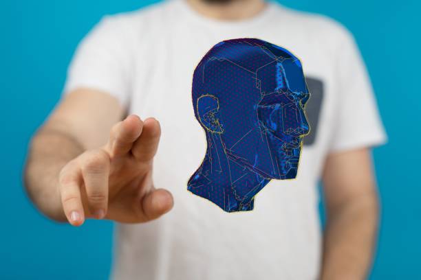 istock Male touching a blue holographic digital style human head , AI and technology concept 1455202108