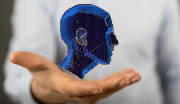 istock Blue holographic digital style human head with numbers in a human hand, AI and technology concept 1455202111