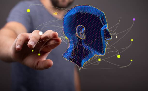 istock Person's hand tapping on the screen with an illustrative human head floating. Concept of technology. 1455202946