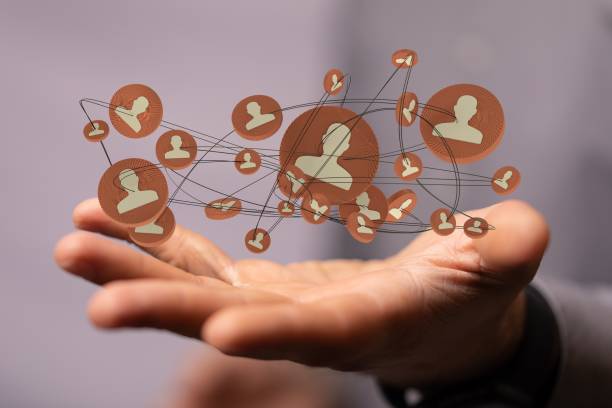 istock 3D rendering of profile icons levitating above a person's hand 1455202970