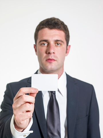 Young businessman showed his business card