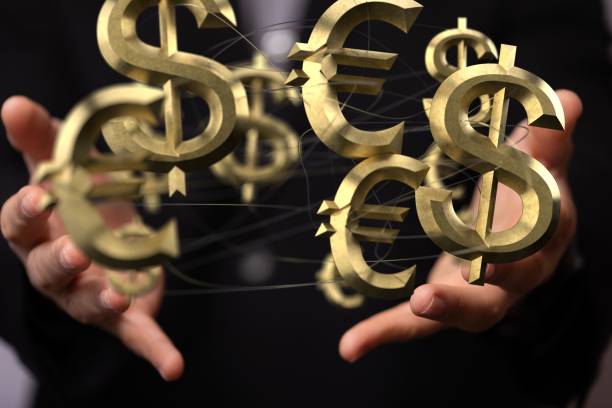 istock Businessman hand on blurred background using 3D rendering US dollars and Euro currency icons 1455205597