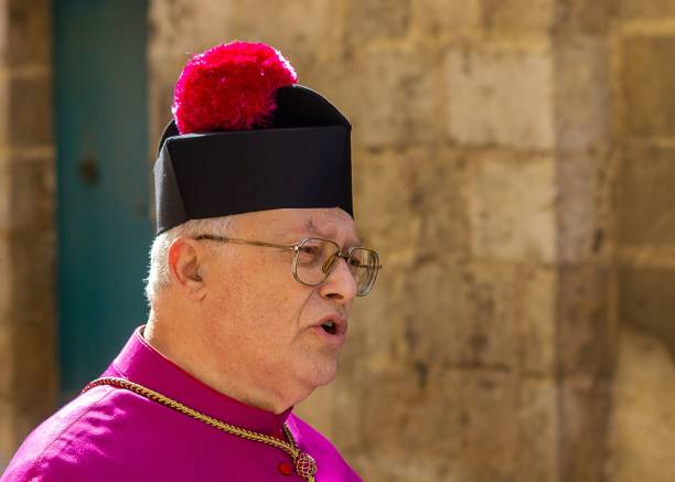 Monsignor wearing birretum Zejtun, Malta – April 20, 2022: Monsignor of the Mdina Metropolitan Cathedral wearing birretum monsignor stock pictures, royalty-free photos & images