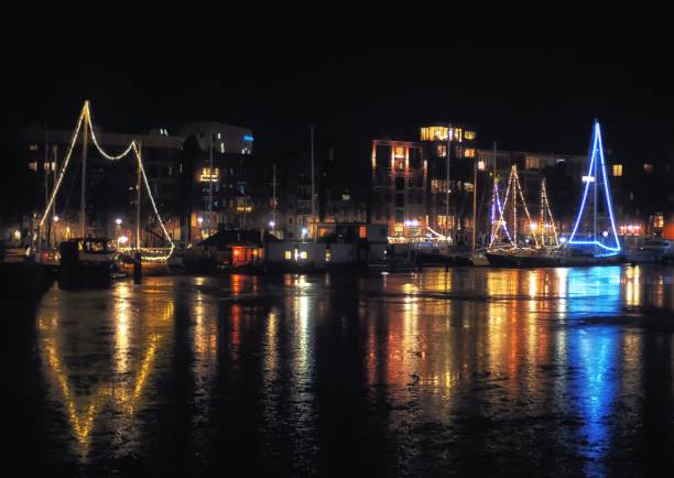 istock City lights and buildings reflection on the water surface at night 1455206737