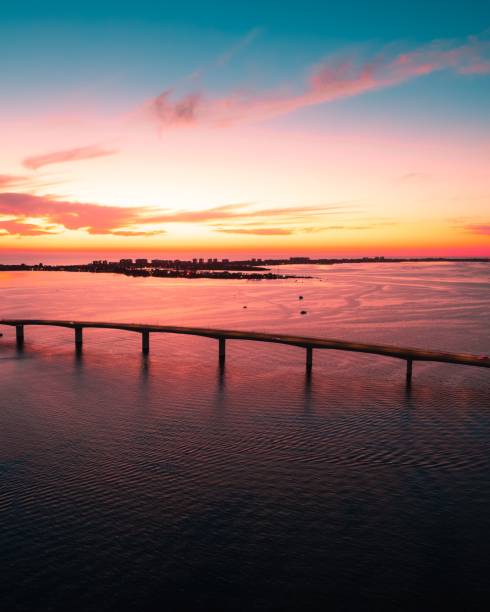 istock Beautiful colorful sunset and a sky reflection on the sea 1455209007