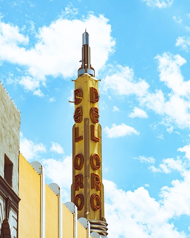 Grass Valley, United States – June 22, 2021: The famous Del Oro movie theater tower against a bright blue cloudy sky