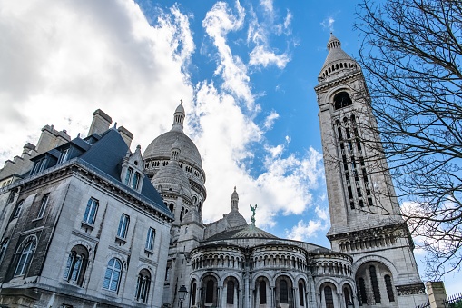 A low angle shot of the Sacre Coeur Basilica in Montmartre, Paris