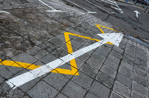White arrow and white and yellow lines abstract backgrounds