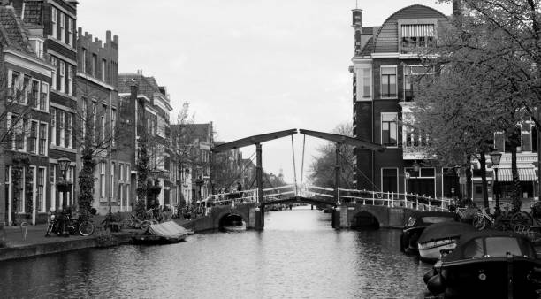istock Beautiful view of a small bridge over the river between buildings 1455213836