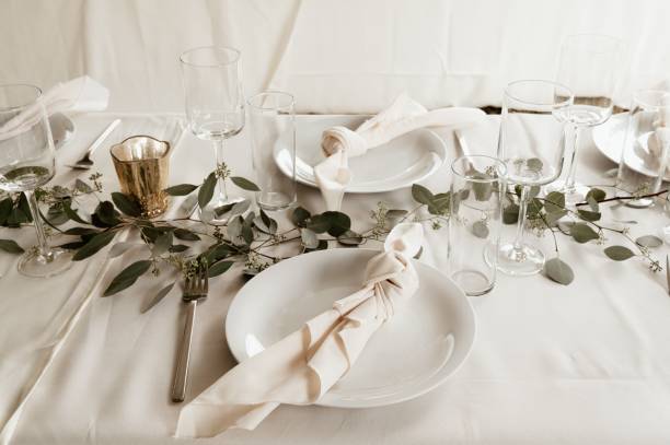 istock White table with dishware and wedding decorations at the restaurant 1455214206