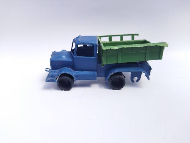 istock Old, broken plastic truck toy with a white background 1455214488