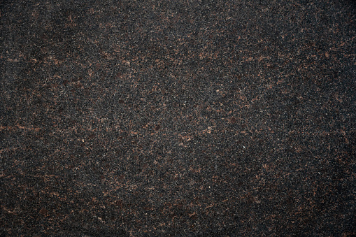 Dark brown granite texture, abstract architecture background