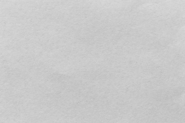 istock White paper sheet texture cardboard background. 1455216589