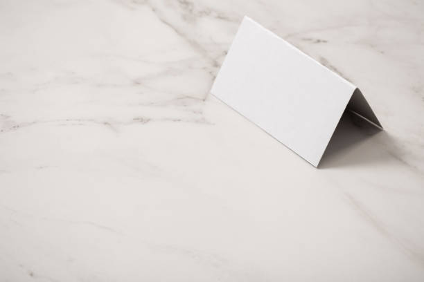 istock white paper blank on marble background 1455225120