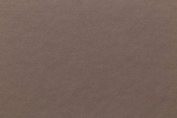 istock Dark gray paper sheet texture cardboard background. 1455226724
