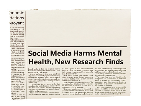 Simulated newspaper clipping about a scientific study finding that social media is bad for mental health, causing depression, anxiety and feelings of social inadequacy. Text was written from scratch by the photographer (an experienced journalist), who also did the design, so this image is free of third-party copyright and may be used without restrictions.