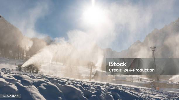 Snowmaking Machine Snow Cannon Or Gun In Action Stock Photo - Download Image Now - Artificial, Blue, Cannon - Artillery