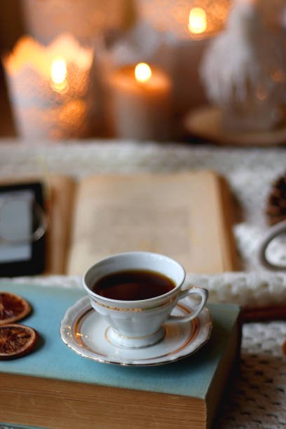 istock Tea, Books, Tablet, Cookies and Candles 1455232012